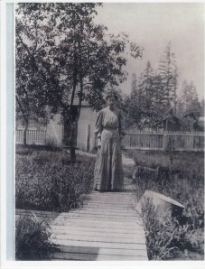 Nellie Van Eaton in the back yard