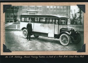 Mr. C.A. Stahlberg, Manual Training Tacher in front of the a 1920 GMC School Bus, 1923