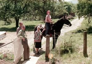 Mary (Burwash) Chalberg on horse Diablo, Susie LeMaster, Clarence LeMaster (front) and Ross LeMaster (behind)