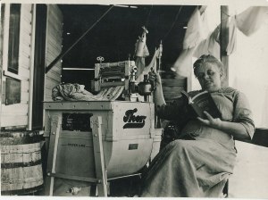 Mrs. Haynes washington with Eatonville's first washing machine